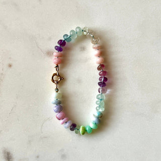 Sea Spray bracelet, mixed gemstones knotted on silk with an 18k gold bolt ring clasp.