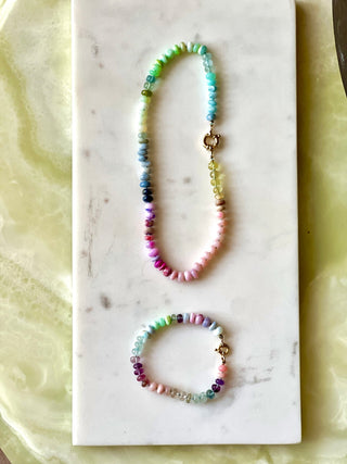Sea Spray bracelet, mixed gemstones knotted on silk with an 18k gold bolt ring clasp.