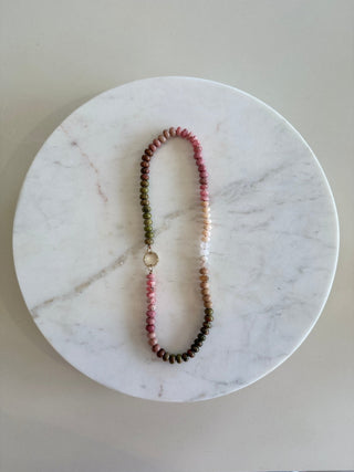 Spumoni Chic necklace, knotted gemstones on blush silk with a 14k gold and diamond connector clasp.