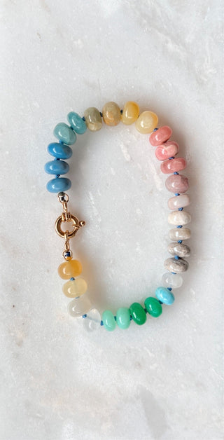 Summer Candies Rainbow bracelet, mixed gemstones knotted on silk with an 18k gold bolt ring clasp.