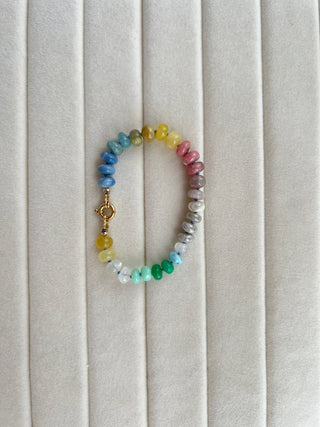Summer Candies Rainbow bracelet, mixed gemstones knotted on silk with an 18k gold bolt ring clasp.