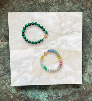 Summer Candies Rainbow bracelet, mixed gemstones knotted on silk with an 18k gold bolt ring clasp.