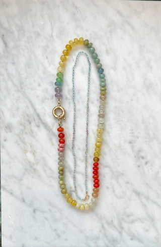 Summer Sunsets Rainbow gemstone necklace close-up, warm sunset toned beads with a 9k gold clasp by Sorsa Jewellery