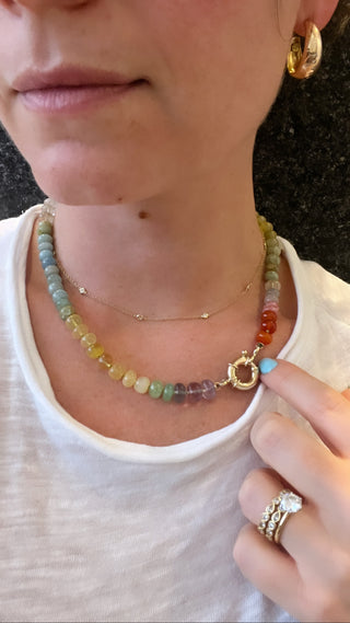Summer Sunsets Rainbow gemstone necklace, hand-knotted silk necklace with a 9k gold bolt clasp by Sorsa Jewellery