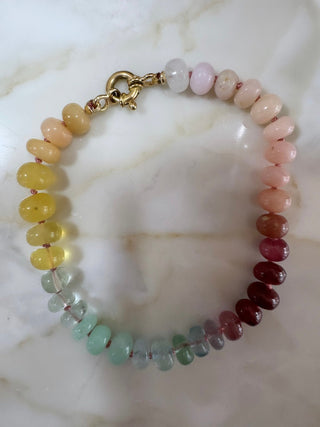 Sweeties Bracelet, mixed gemstones knotted on silk with an 18k gold clasp.