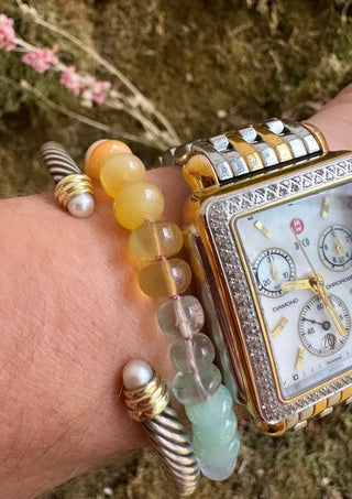 Sweeties Bracelet, mixed gemstones knotted on silk with an 18k gold clasp.