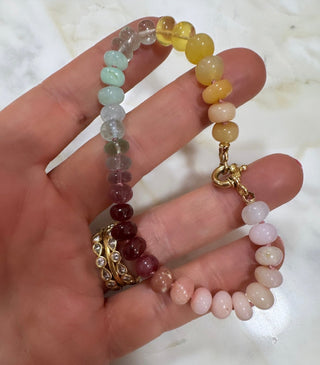 Sweeties Bracelet, mixed gemstones knotted on silk with an 18k gold clasp.