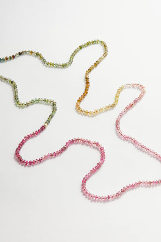 Tourmaline pullover necklace, hand-knotted on silk with a solid 14k gold bead, no clasp.
