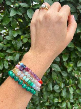 Tropical Rainbow bracelet, mixed gemstones knotted on silk with an 18k gold bolt ring clasp.