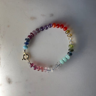 Tropical Rainbow bracelet, mixed gemstones knotted on silk with an 18k gold bolt ring clasp.