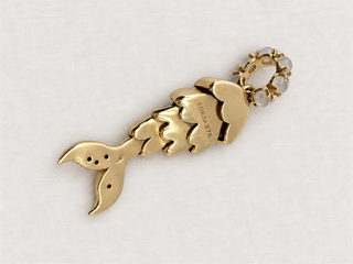 Back view of the Tsavorite Mermaid Tail Charm in blackened 9k gold, by Sorsa Jewellery.