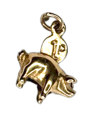 Vintage 9ct gold piggy bank charm with a tiny moveable 1p coin.