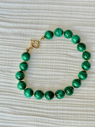 X-Large Malachite bracelet, malachite beads knotted on silk with an 18k gold bolt ring clasp.