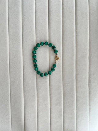 X-Large Malachite bracelet, malachite beads knotted on silk with an 18k gold bolt ring clasp.
