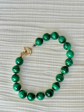 X-Large Malachite bracelet, malachite beads knotted on silk with an 18k gold bolt ring clasp.